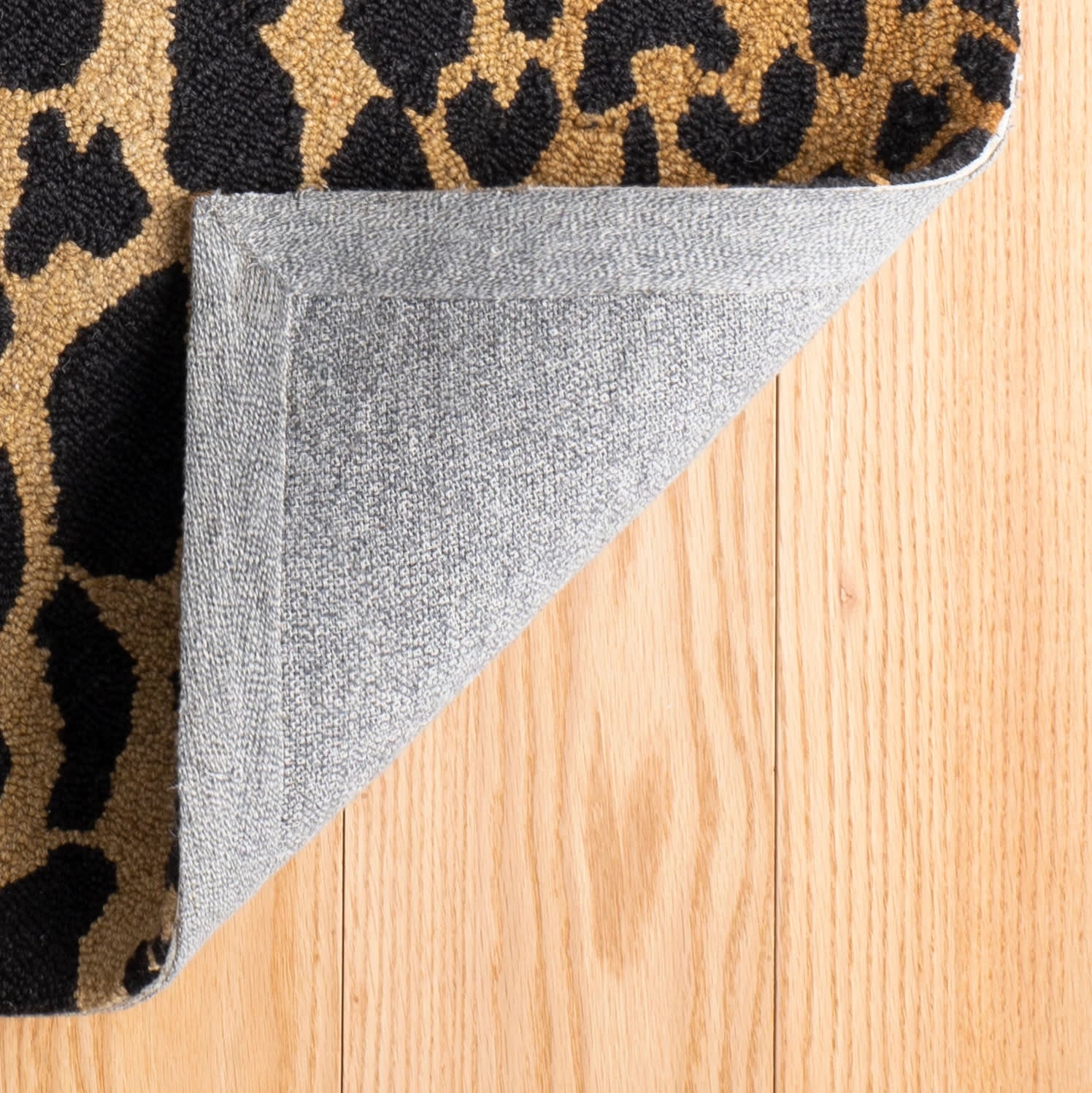 leopard hand micro hooked wool rug | brown leopard hand micro hooked wool rug | brown