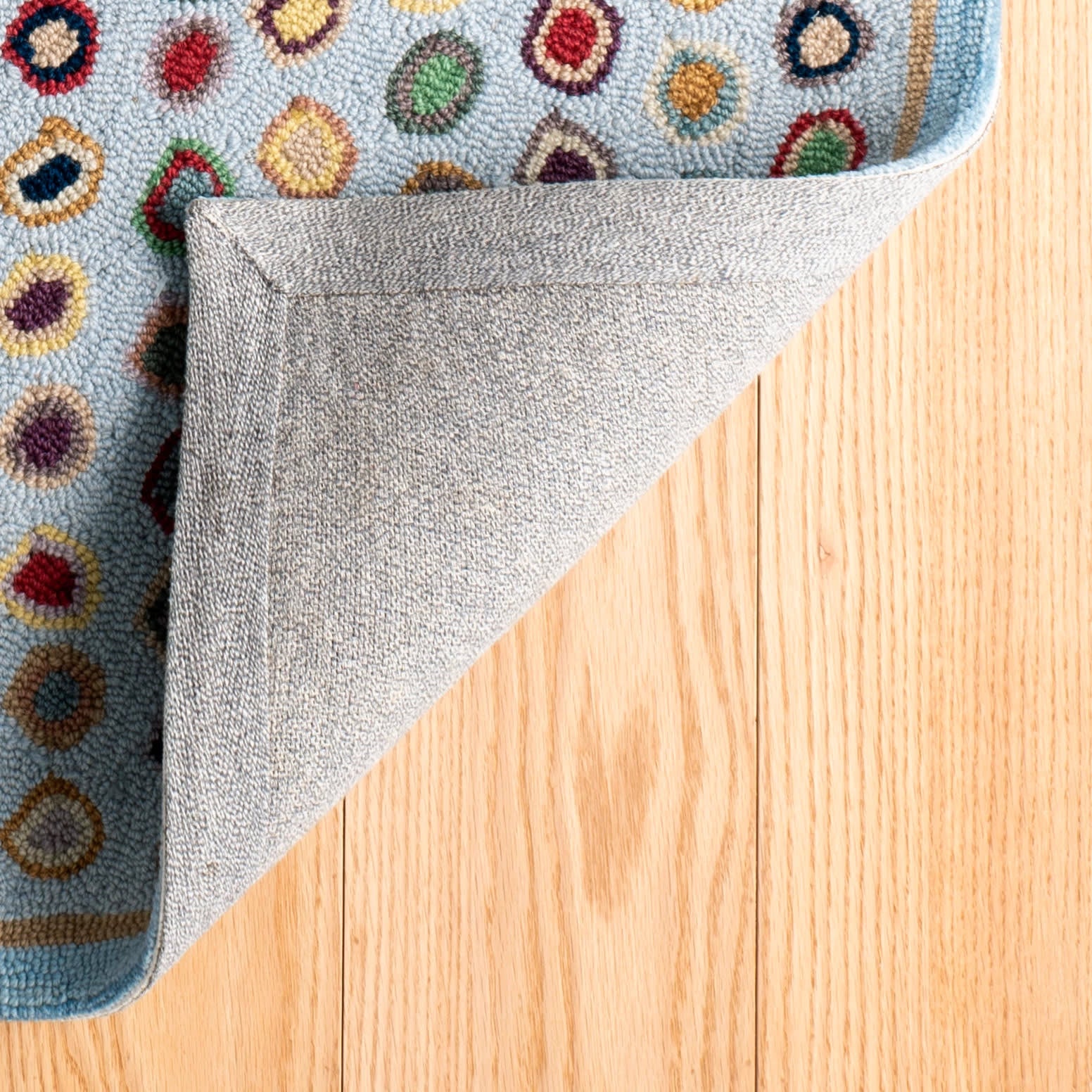 cat's paw hand micro hooked wool rug | blue cat's paw hand micro hooked wool rug | blue