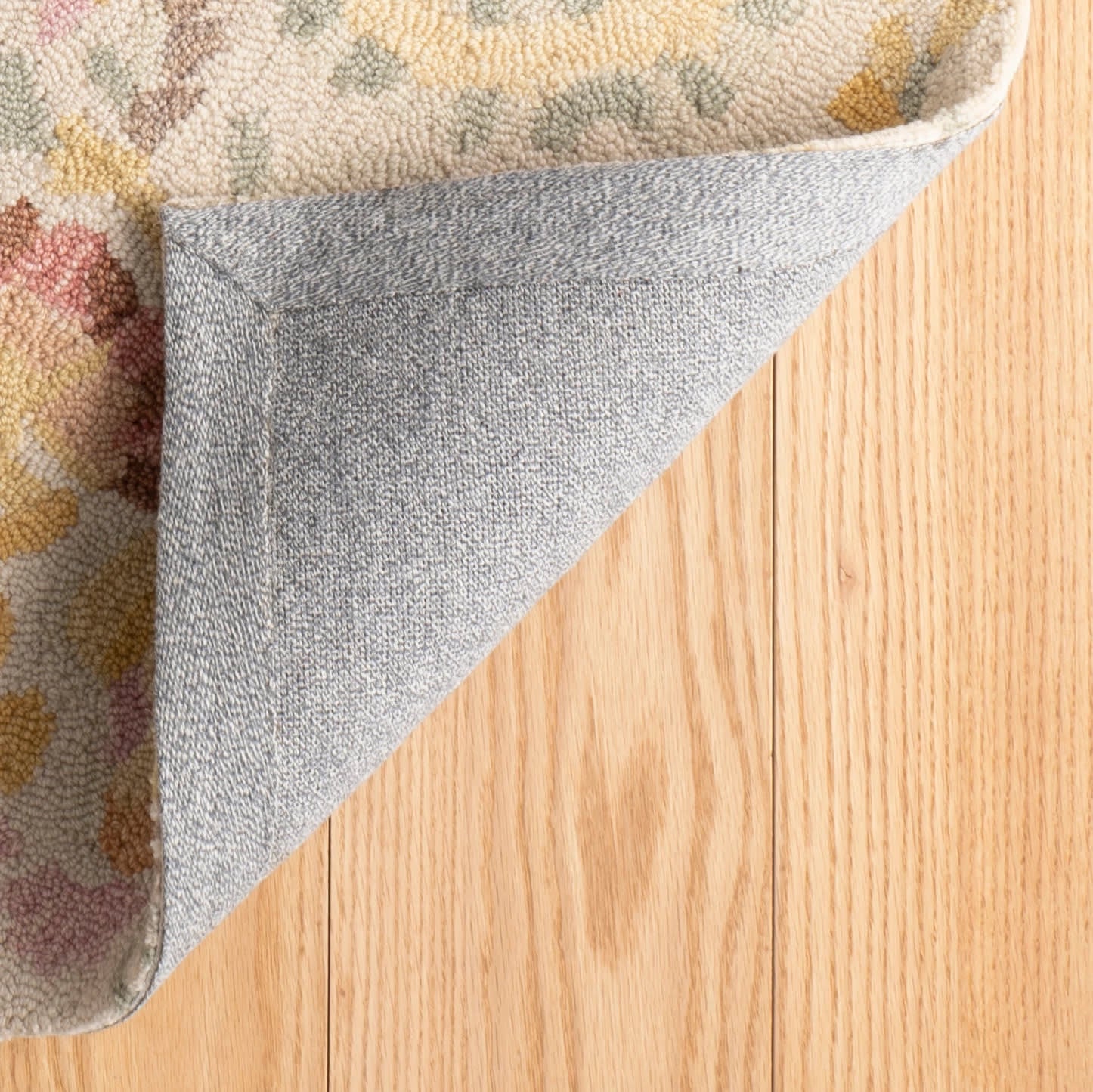 ines hand micro hooked wool rug | multi ines hand micro hooked wool rug | multi